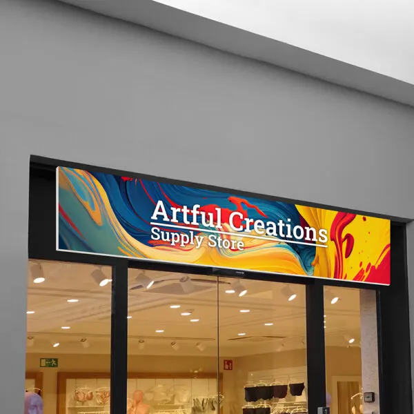 Storefront fascia LED sign running bright content above an entrance