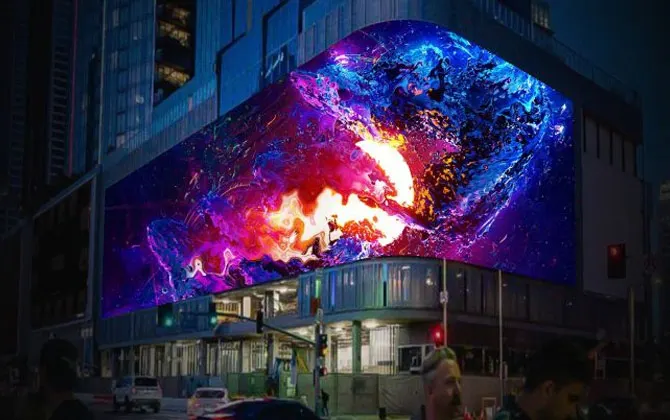 LED advertising billboard glowing on a building facade at night